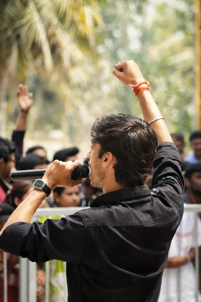 Open Mic — Satyam hosting on stage